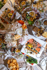 various dishes and snacks on the buffet table at the celebration