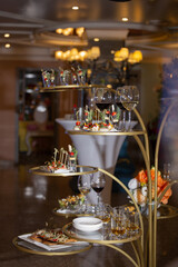 snacks and alcohol on the counter at the restaurant at the event