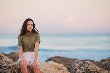 Young beautiful woman relax on the beach