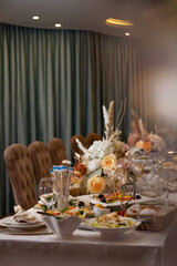 various dishes and snacks on the buffet table at the celebration