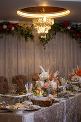 festive table in the restaurant with various dishes