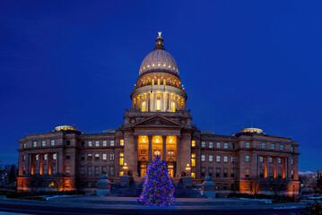 Iconic Idaho State Capital with a Christmas tree at night