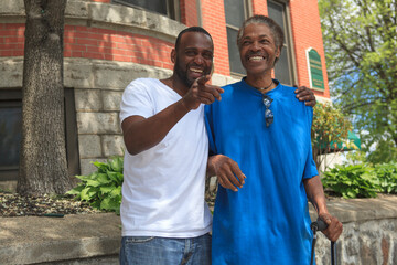 Man with Traumatic Brain Injury with cane enjoying his friend