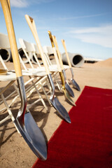 Construction ground breaking ceremony with red carpet