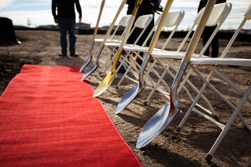 Construction ground breaking ceremony with red carpet - obrazy, fototapety, plakaty
