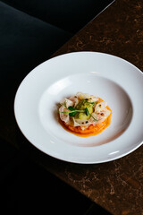 salmon carpaccio with sauce and crispy chips