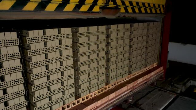 Brick Factory. Production of Bricks and Ceramic Wall Materials for Construction.Industrial Production of Bricks.The Brick Kilns.Raw Bricks are Fired in an Oven at High Temperature