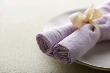 View of rolled up linen napkins