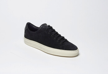 Black casual sneakers with black base and white background, Black casual sneakers with black base and white background