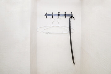 hanger on a white wall.