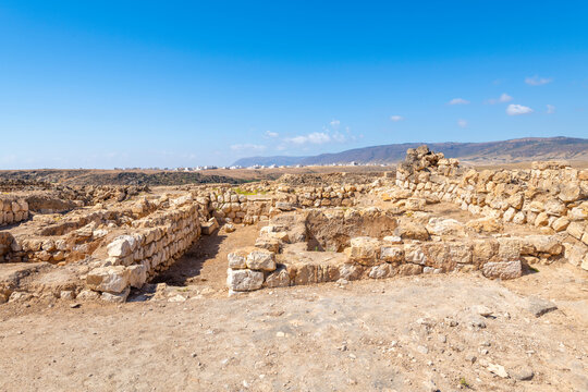 The ruins of the ancient 3rd Century BC fortified port city of Sumhuram, an import harbor for frankincense trade, at Khor Rori, or Khawr Rawri lagoon in the Dhofar region of Oman.