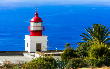 Fototapeta na wymiar Madeira island scenic places. Lighthouse with stunning ocean view in Ponta do Pargo