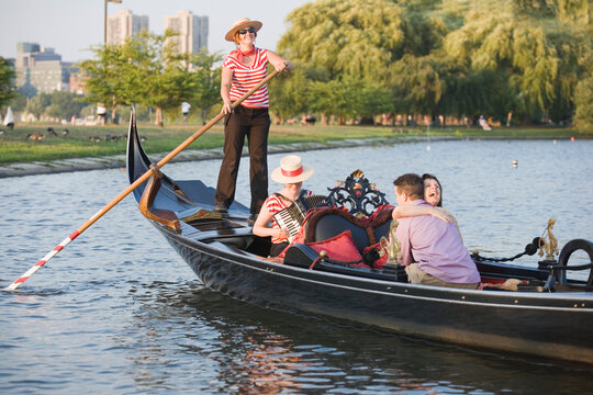Mid adult couple romancing in a gondola