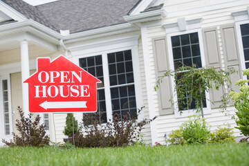 Open House signboard in front of a house