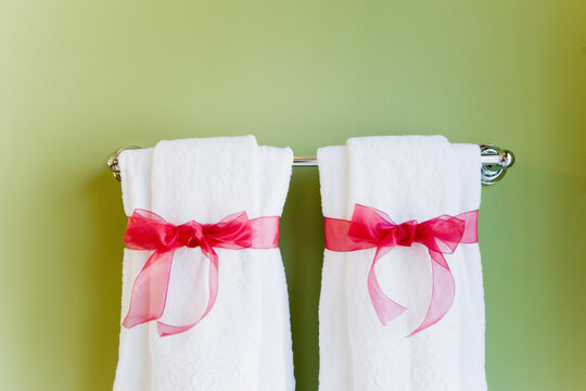 Close-up of towels hanging on a towel rail in the bathroom