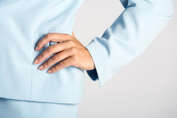 Midsection of a business woman.