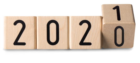 Wooden cube or block on desk with numbers 2021