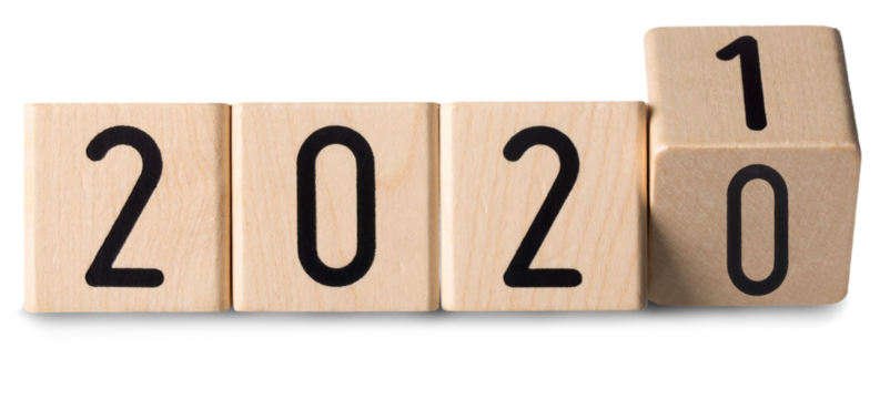 Wooden cube or block on desk with numbers 2021