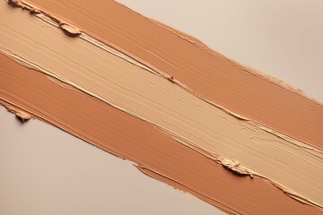 Cosmetic concealer or foundation smudge texture background on beige background