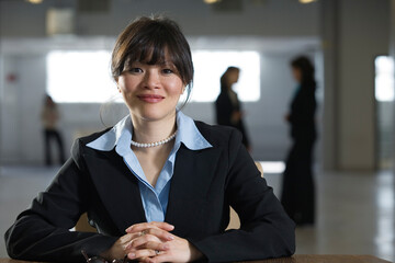 Portrait of business woman smiling.