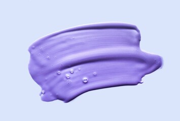 Purple glossy mask foam cleanser texture isolated on blue