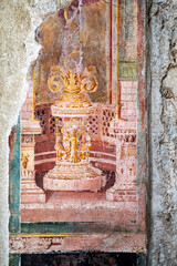 Winged cupids fight, little gods of ancient Rome in Pompeii. Pompeii was destroyed by the volcanic eruption of Vesuvius in 79 BC