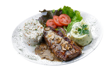 Beef steak with potatoes and rice in isolated white background