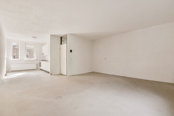 an empty room with white walls and no one person in the room to see what is going on the wall