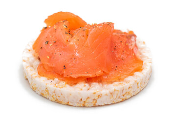 Tasty Rice Cake Sandwich with Fresh Salmon Slices Isolated on White. Easy Breakfast and Diet Food....