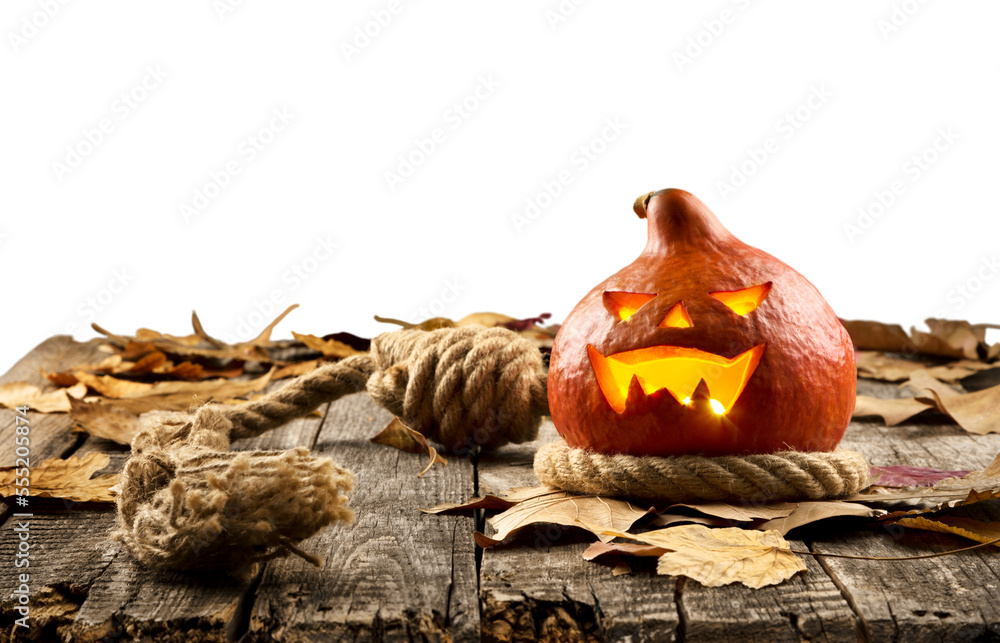 Sticker Halloween pumpkin on the desk with a scary face