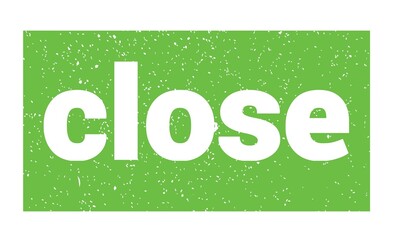 close text written on green stamp sign.