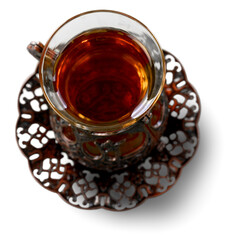 Hot tea in bronze cup. Ramadan Kareem.