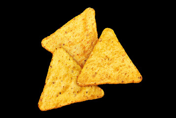 Delicious nachos chips, isolated on black background