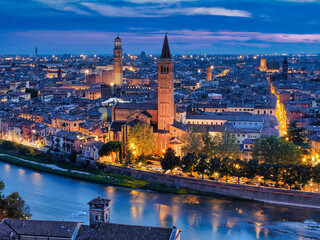 Verona, Veneto, Italy. View of Verona during the blue hour from the San Pietro hill and the Adige...
