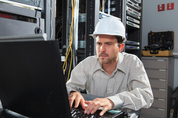 Network engineer at configuration laptop