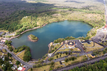 aerial video view of area around Ganga Talao ( Grand Bassin) a crater lake  in district of Savanne, Mauritius with 
"The She Mandir" temple dedicated to Lord Shiva and other temples. K4 footage