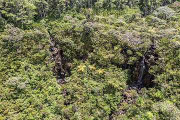 Alexandra Falls Mauritius - aerial view of remote area in the Black River national park on paradise Island of Mauritius with the Waterfall opposite Alexandra Falls View Point with observation deck 