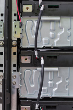 Energy storage batteries for back up power to an electric power plant