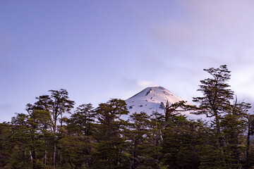 Villarrica volcano in the setting sun; Pucon, Chile 