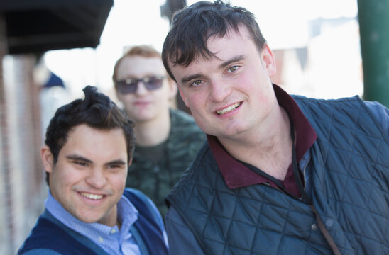 Middle Eastern man with Down Syndrome and two friends, each having a Learning Disability