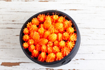Homemade Cauldron Cake on light white background above horizontal shot