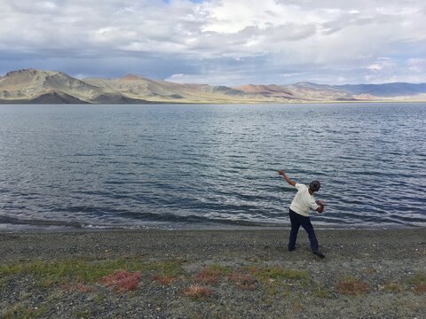 Throwing Stones at Tolbo Lake, Mongolia