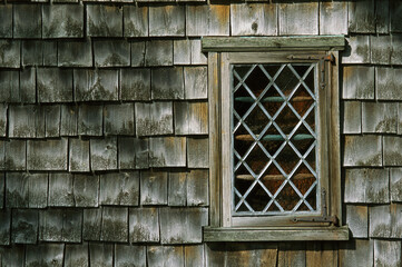 Window and shingled side of the Hoxie House, circa 1665.; Sandwich, Cape Cod, Massachusetts.