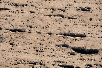 View of an abstract stone texture. Texture of weathered stone tiles.