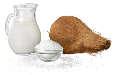 Coconut and a bottle with coconuts milk and grated coconut