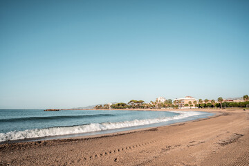 empty beach in the mediterranean sea on a sunny day