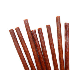 Smoked thin sausages, isolated on white