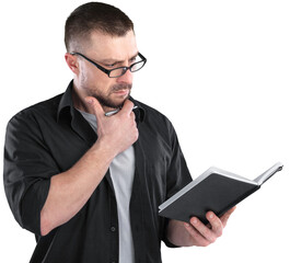 Young male teacher standing with a book