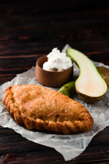 Pears baked in puff pastry with gorgonzola cheese