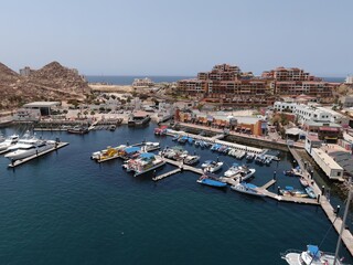 Fototapeta na wymiar Aerial of boats and yachts in Cabo San Lucas marina